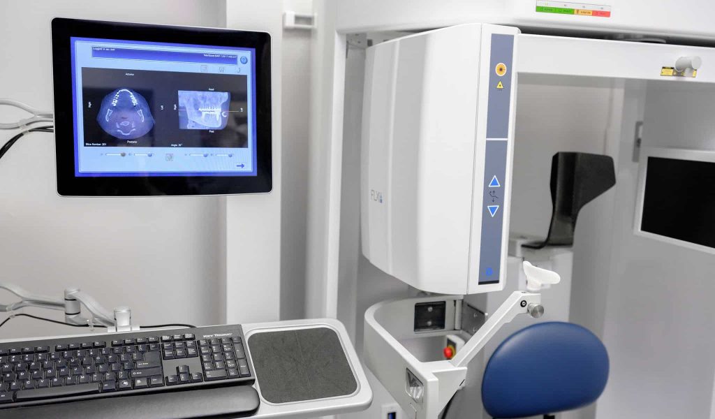 An i-CAT FLX 3D cone beam CT (CBCT) scanner in a dedicated dental imaging suite